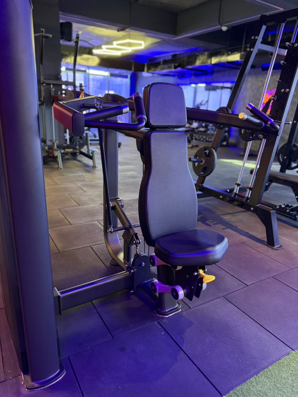 Seated calf raise machine